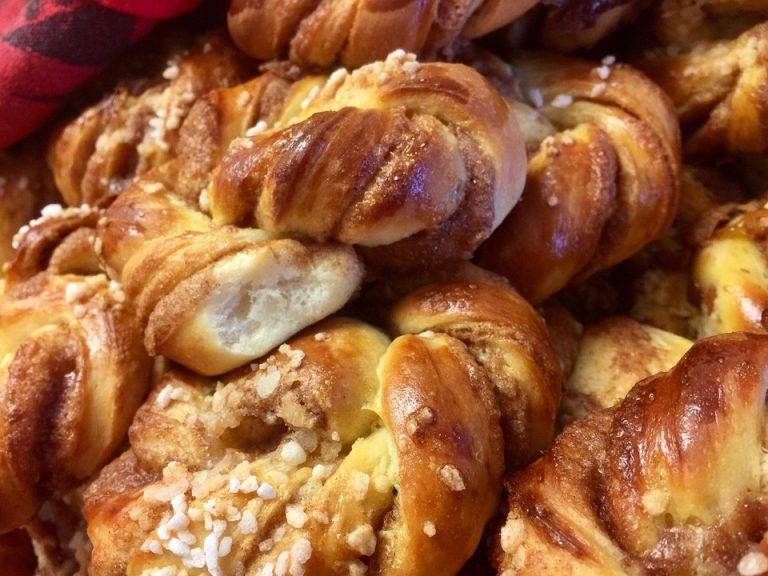 Sweet braided cinnamon buns with sugar topping.