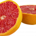 Half pink grapefruit with juicy flesh.