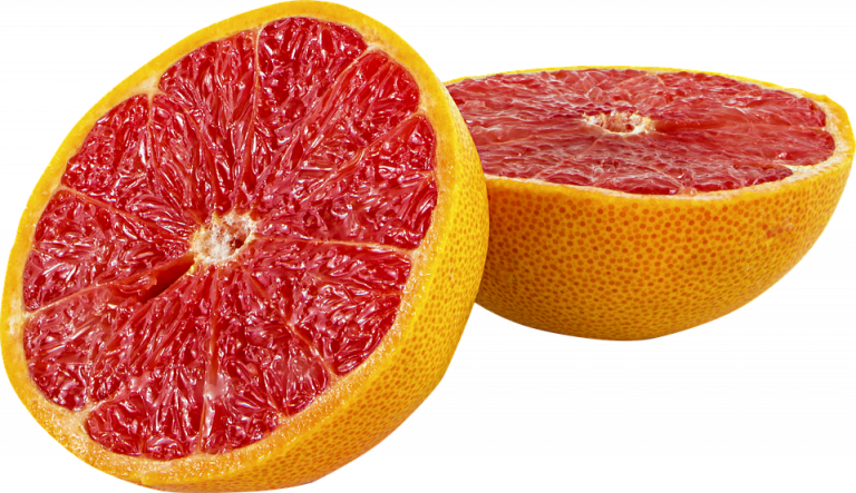 Half pink grapefruit with juicy flesh.