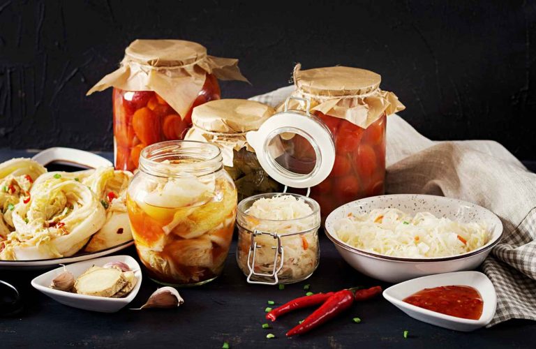 Cabbage kimchi, tomatoes marinated, sauerkraut sour glass jars