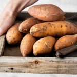 Sweet potatoes in wooden box