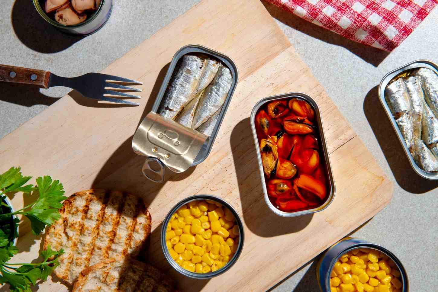 Top view food packaged in cans sardines