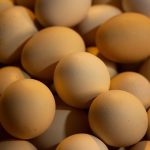 A pile of brown eggs.