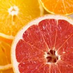 a close up of a grapefruit cut in half