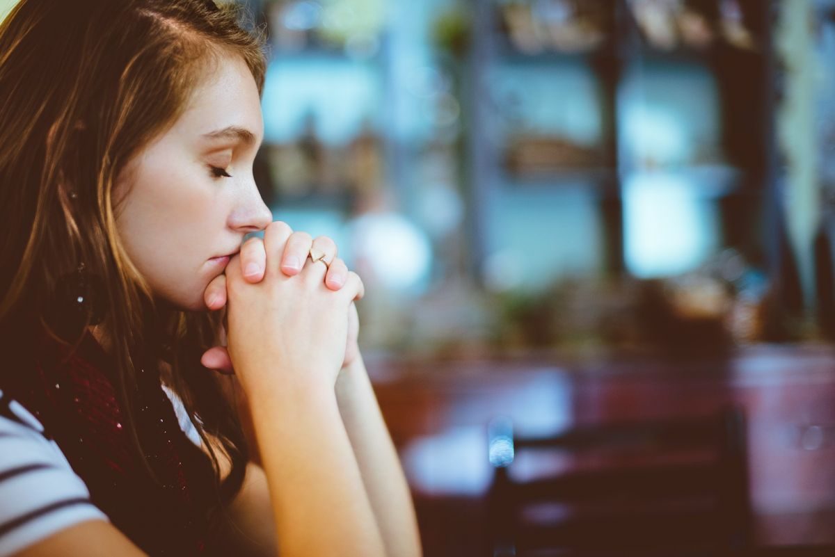 woman praying Intermittent Fasting