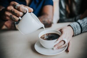 coffee, milk, hands, pour, pouring, caffeine, ceramics, cup, drink, mug, people, couple, man, woman, brewed coffee, coffee break, coffee cup, morning coffee
