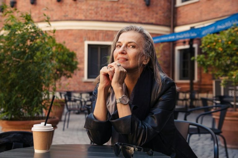 a woman sitting at a table